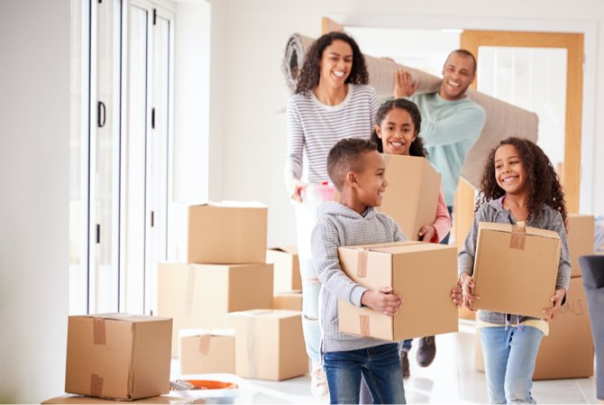 Family moving with boxes